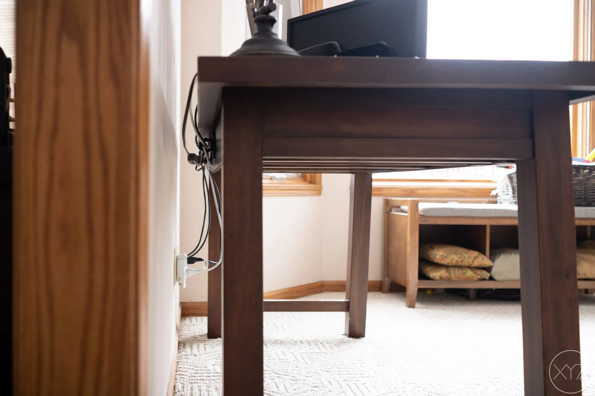 Cables held neatly behind the desk by the printed clips