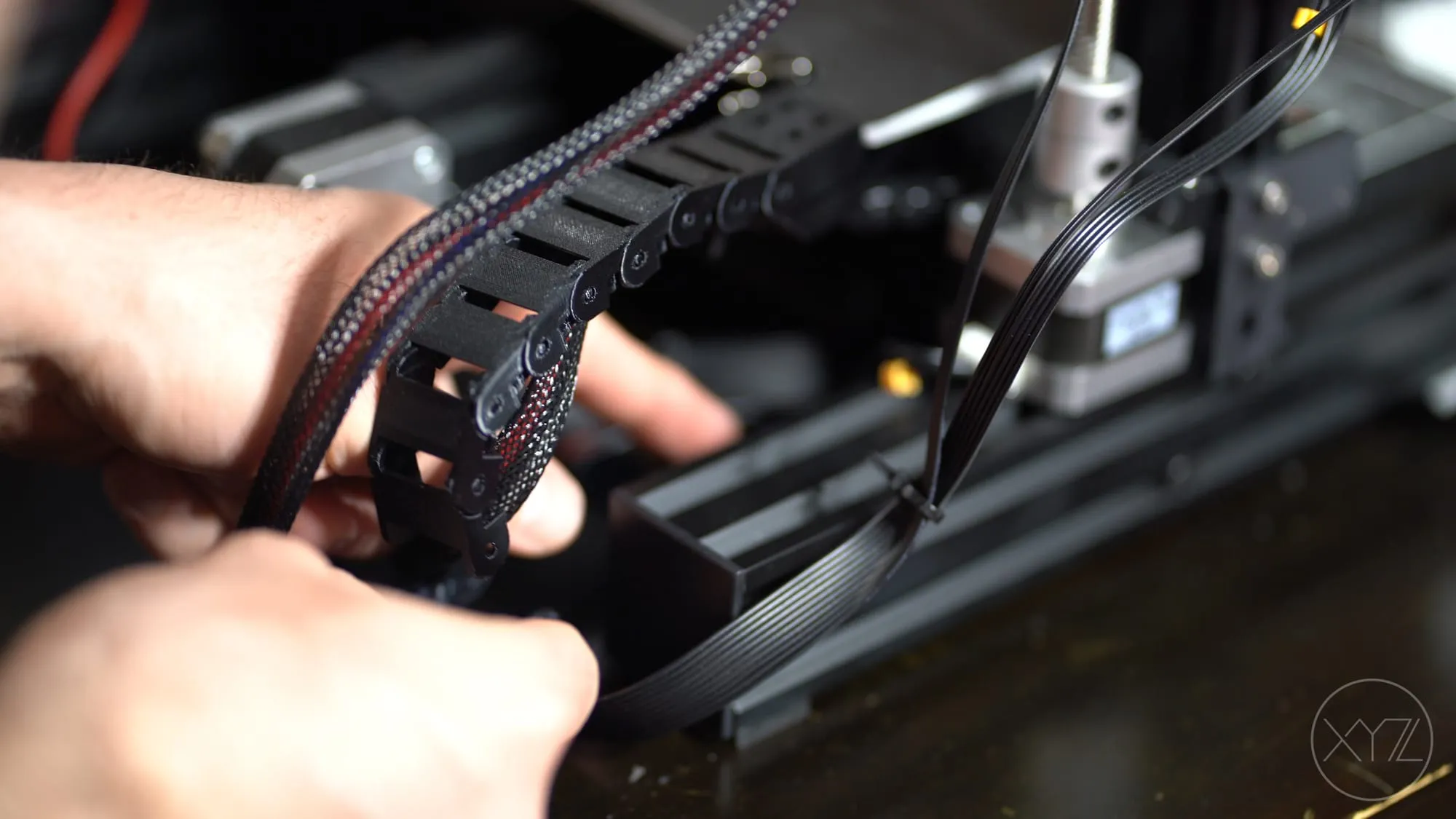 3D printed cable carrier protecting the Ender 3 heat bed cable